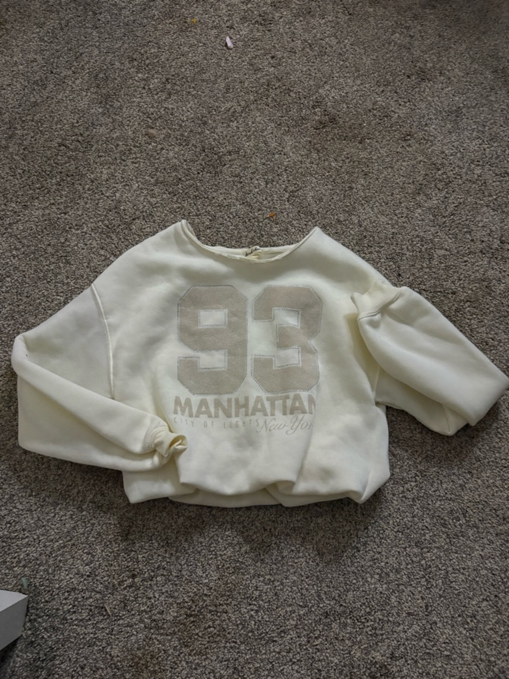 Off-the-Shoulder Cream Manhattan Graphic Sweatshirt